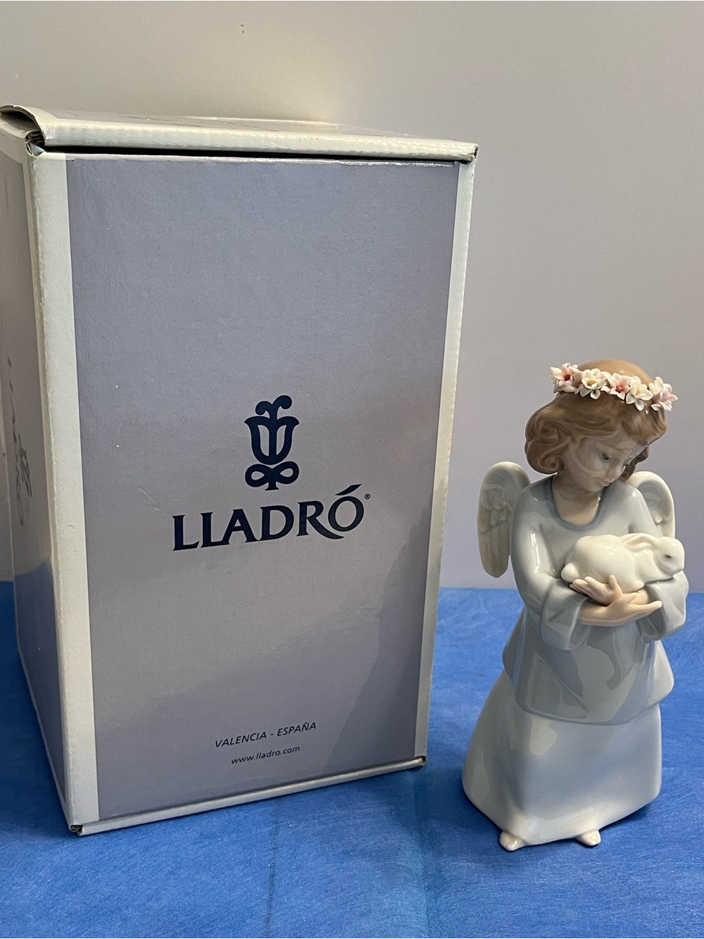 Lladro “Heavenly love”Porcelain Angel Figurine in Soft Blue with Floral Crown